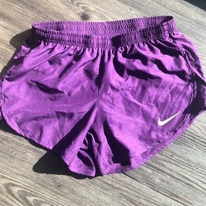Purple nike running shorts